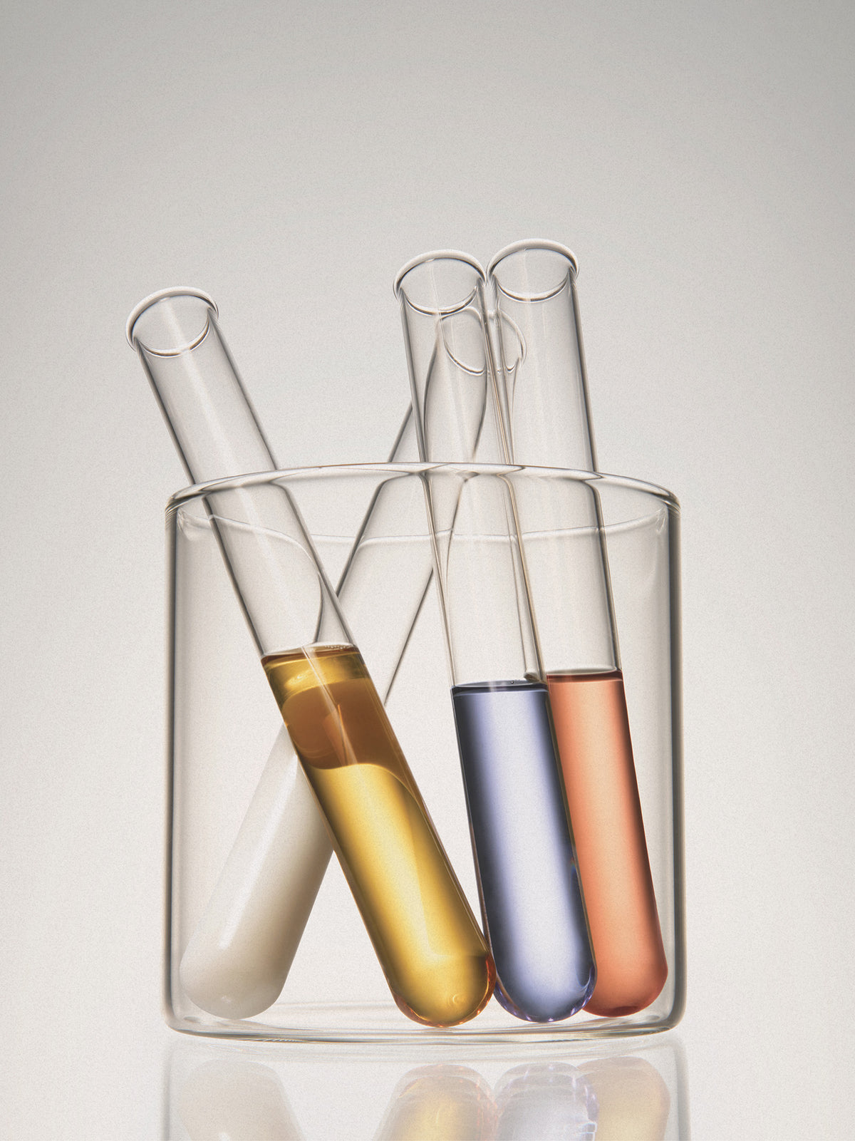 Glass test tubes of coloured serum standing in a beaker